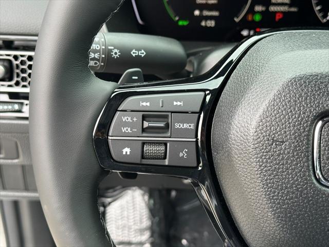 Photo of 2026 Solar Silver Metallic Honda Civic Hybrid