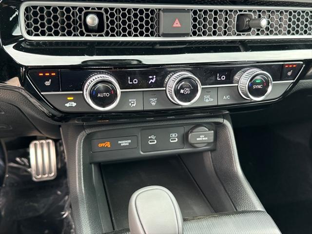 Photo of 2026 Solar Silver Metallic Honda Civic Hybrid