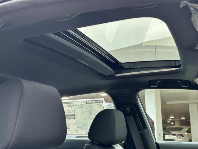 Photo of 2026 Solar Silver Metallic Honda Civic Hybrid
