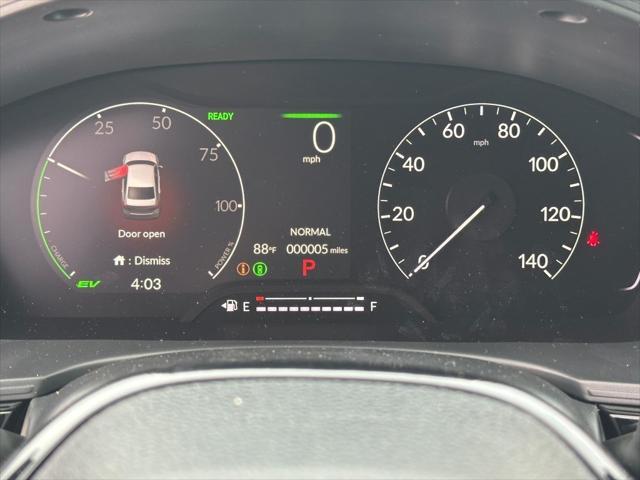 Photo of 2026 Solar Silver Metallic Honda Civic Hybrid