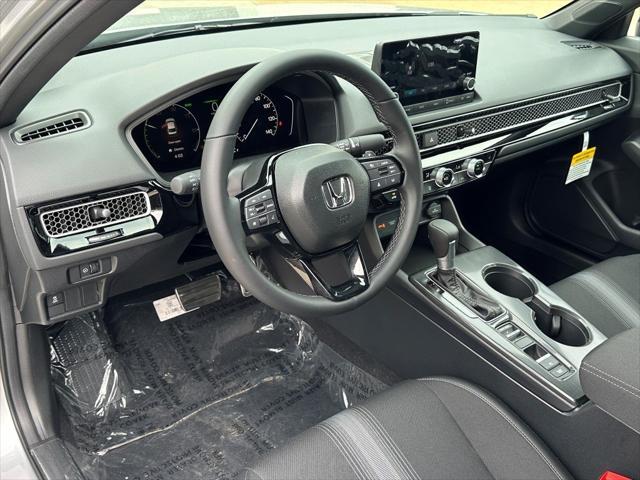 Photo of 2026 Solar Silver Metallic Honda Civic Hybrid