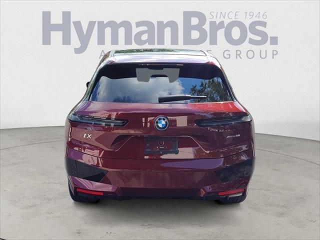 Photo of 2024 Aventurin Red Metallic BMW iX