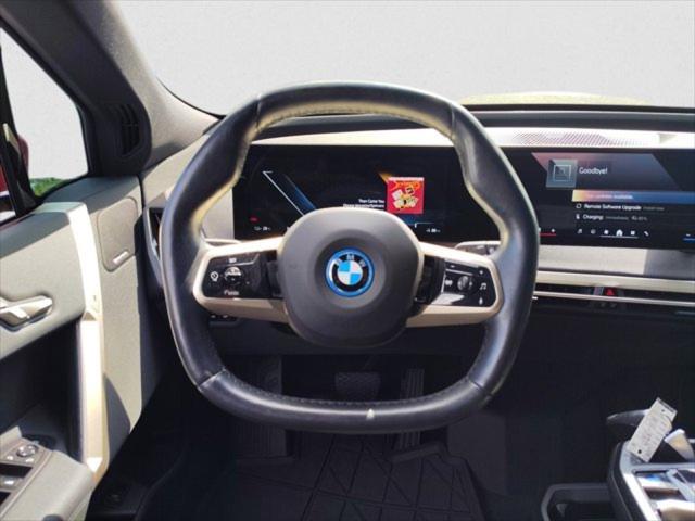 Photo of 2024 Aventurin Red Metallic BMW iX