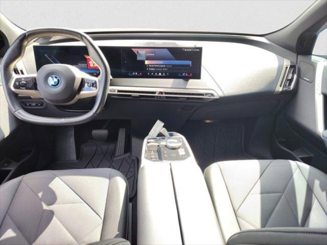 Photo of 2024 Aventurin Red Metallic BMW iX