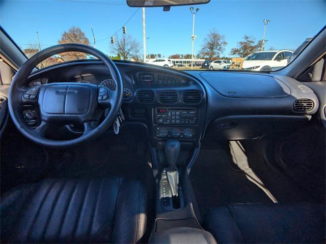Photo of 1999 Bright Red Pontiac Grand Prix