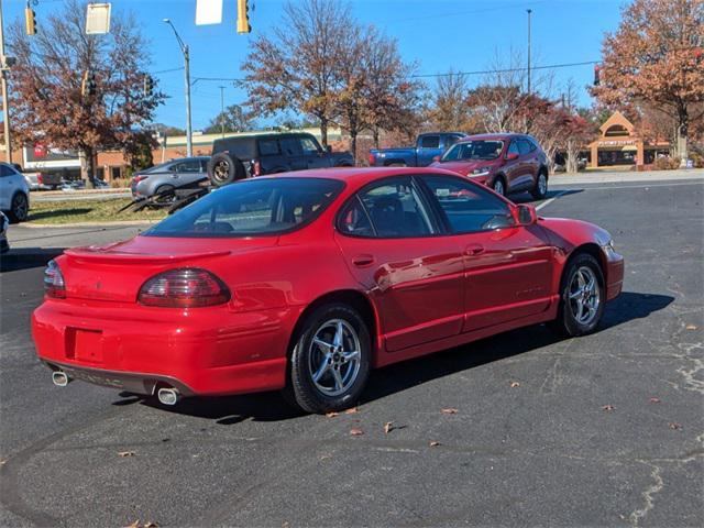 Photo of 1999 Bright Red Pontiac Grand Prix