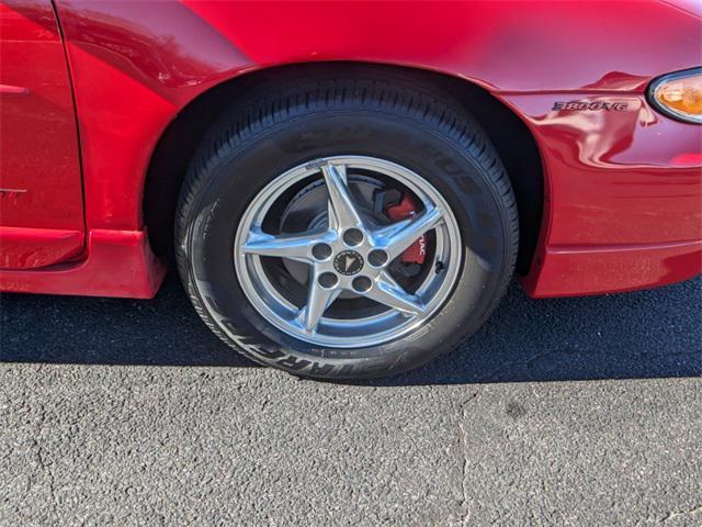 Photo of 1999 Bright Red Pontiac Grand Prix