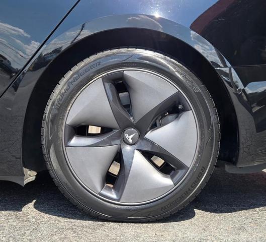 Photo of 2019 Black Tesla Model 3