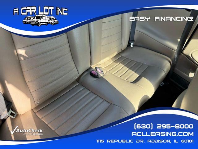 Photo of 2004 Burgundy Ford Mustang