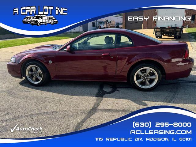 Photo of 2004 Burgundy Ford Mustang