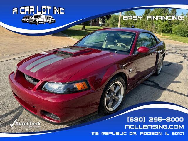 Photo of 2004 Burgundy Ford Mustang