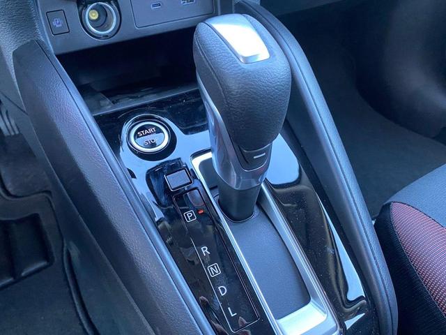 Photo of 2025 Scarlet Ember Tintcoat Nissan Versa