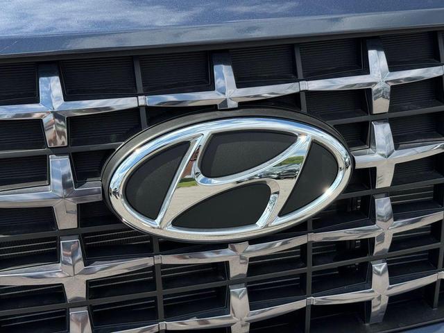 Photo of 2025 Denim w/White Roof Hyundai VENUE