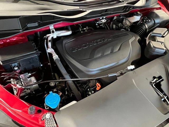 Photo of 2025 Radiant Red Metallic II Honda Odyssey