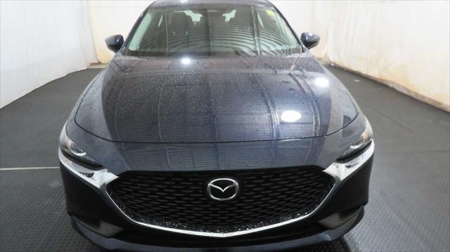 Photo of 2024 Deep Crystal Blue Mica Mazda Mazda3