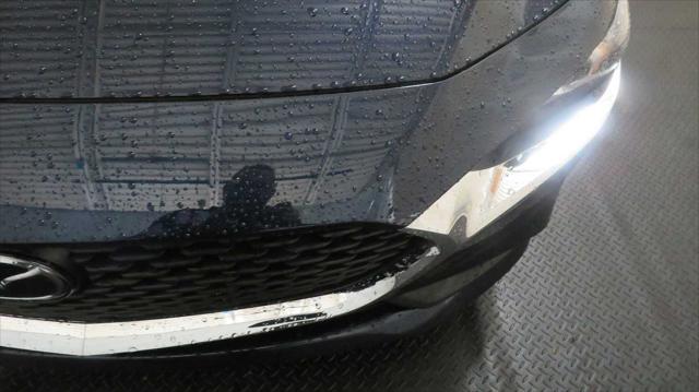 Photo of 2024 Deep Crystal Blue Mica Mazda Mazda3
