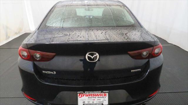 Photo of 2024 Deep Crystal Blue Mica Mazda Mazda3
