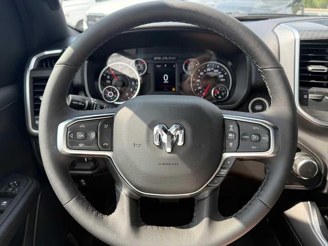 Photo of 2025 Diamond Black Crystal Pearlcoat RAM 1500