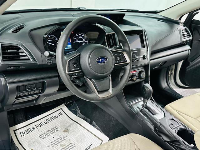 Photo of 2023 Crystal White Pearl Subaru Impreza