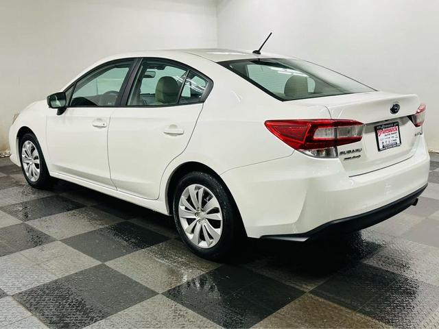 Photo of 2023 Crystal White Pearl Subaru Impreza