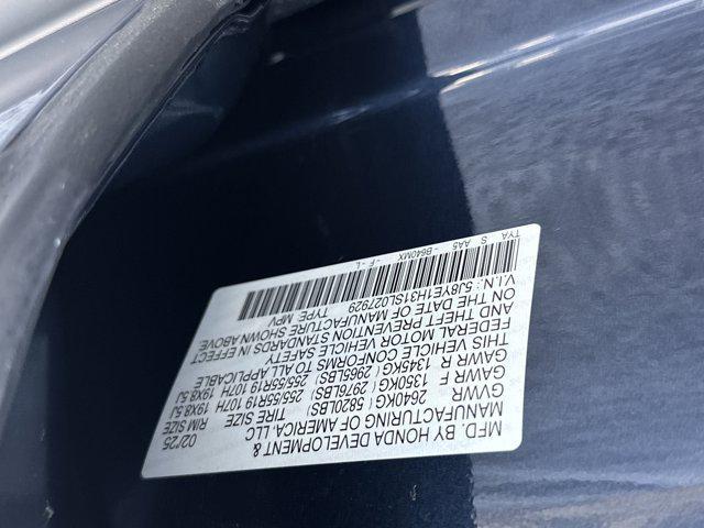 Photo of 2025 Canyon River Blue Metallic Acura MDX