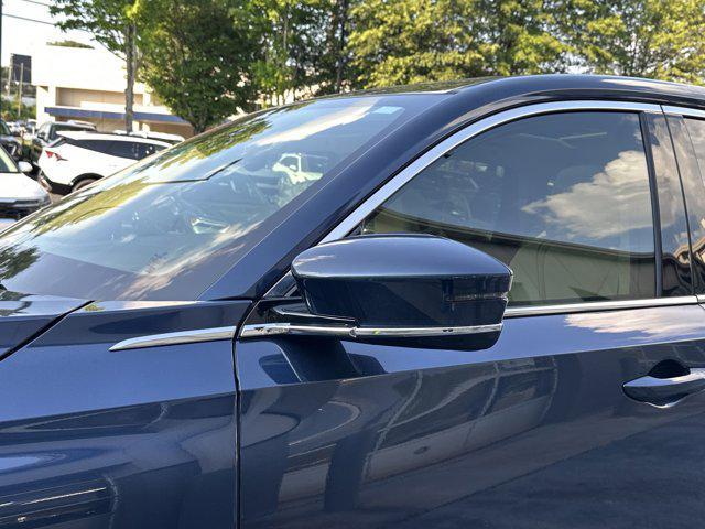 Photo of 2025 Canyon River Blue Metallic Acura MDX