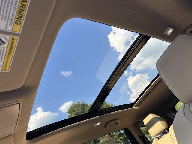 Photo of 2025 Canyon River Blue Metallic Acura MDX