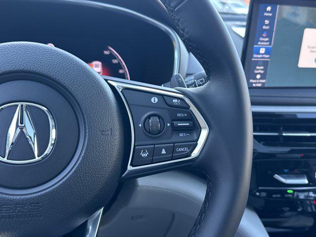 Photo of 2026 Canyon River Blue Acura MDX