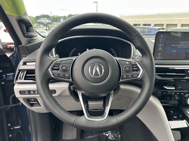 Photo of 2026 Canyon River Blue Acura MDX
