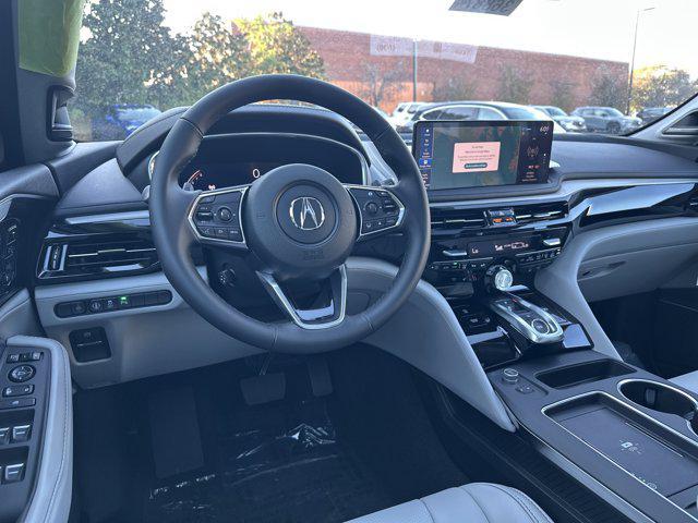 Photo of 2026 Canyon River Blue Acura MDX