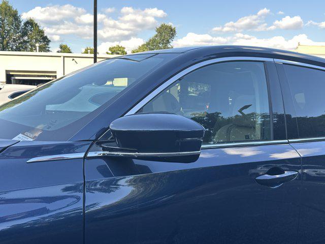 Photo of 2025 Canyon River Blue Metallic Acura MDX