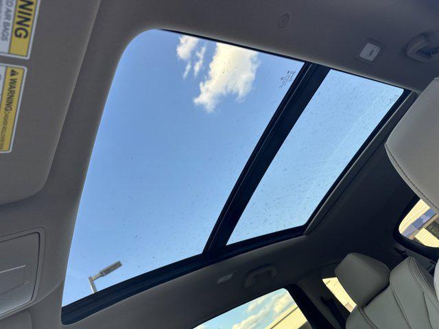 Photo of 2025 Canyon River Blue Metallic Acura MDX