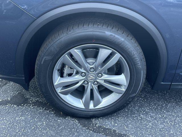 Photo of 2025 Canyon River Blue Metallic Acura MDX