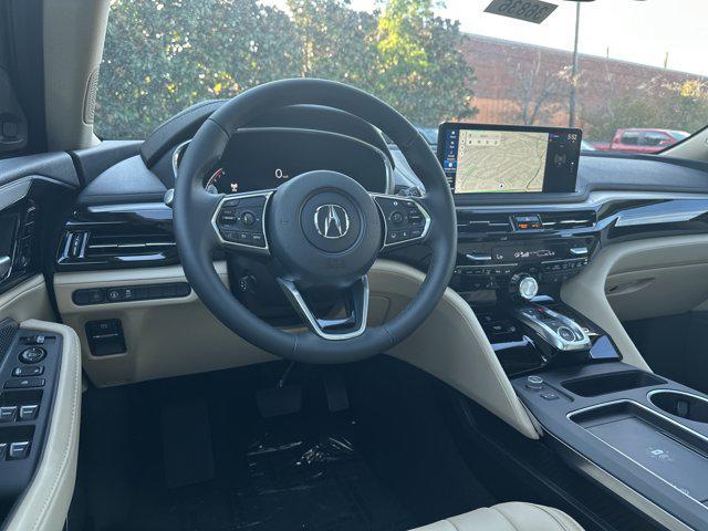 Photo of 2025 Canyon River Blue Metallic Acura MDX