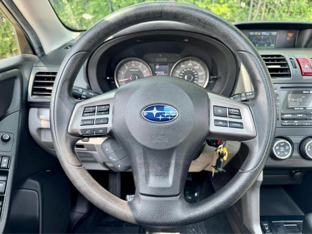 Photo of 2015 Jasmine Green Metallic Subaru Forester