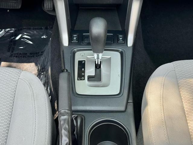 Photo of 2015 Jasmine Green Metallic Subaru Forester
