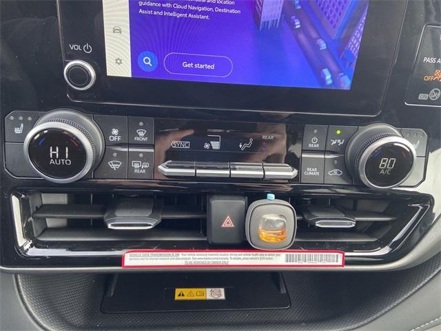 Photo of 2024 Wind Chill Pearl Toyota Highlander Hybrid