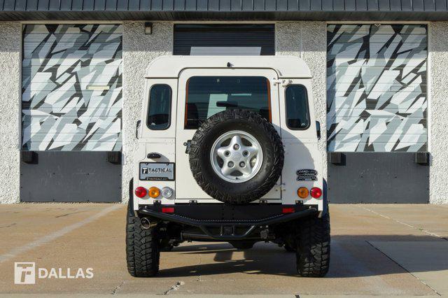 Photo of 1997 Alpine White Land Rover Defender