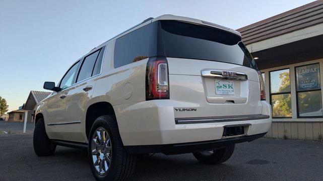 Photo of 2015 White GMC Yukon
