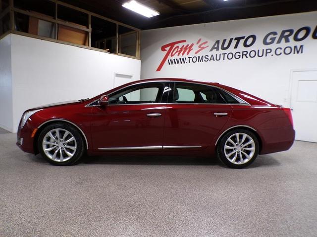 Photo of 2016 Red Passion Tintcoat Cadillac XTS