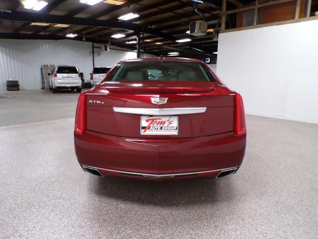 Photo of 2016 Red Passion Tintcoat Cadillac XTS