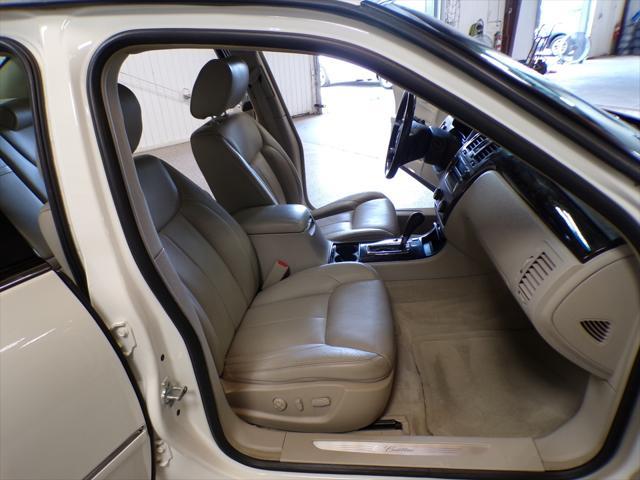 Photo of 2011 Cotillion White Cadillac DTS
