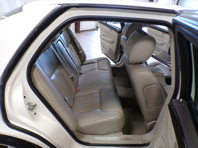 Photo of 2011 Cotillion White Cadillac DTS