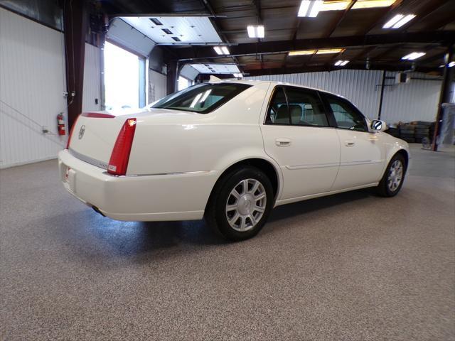 Photo of 2011 Cotillion White Cadillac DTS