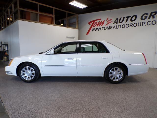 Photo of 2011 Cotillion White Cadillac DTS