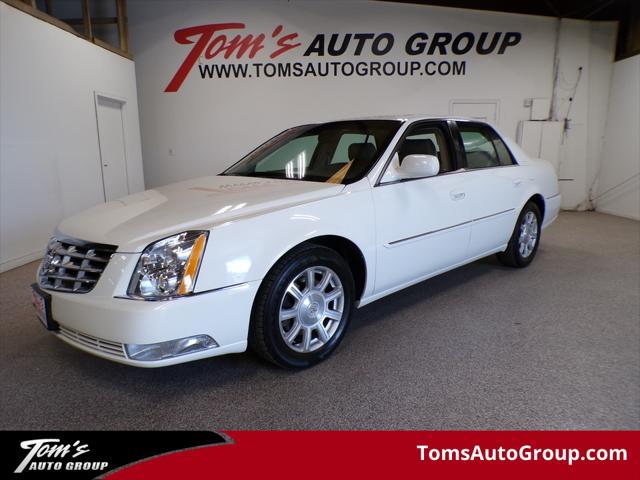 Photo of 2011 Cotillion White Cadillac DTS