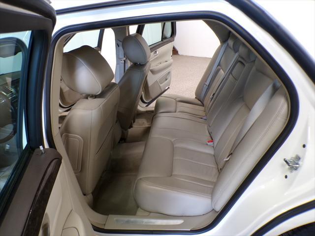 Photo of 2011 Cotillion White Cadillac DTS