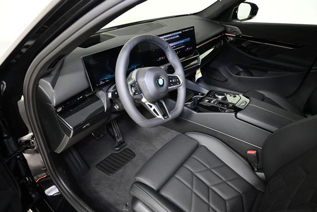 Photo of 2026 Black Sapphire Metallic BMW 530