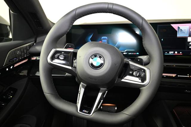 Photo of 2026 Black Sapphire Metallic BMW 530