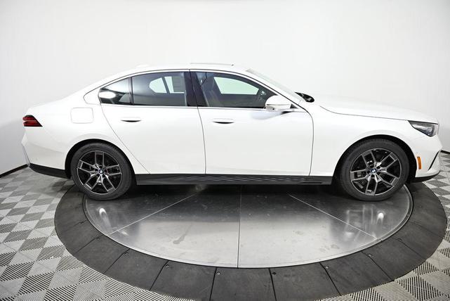Photo of 2026 Mineral White Metallic BMW 530